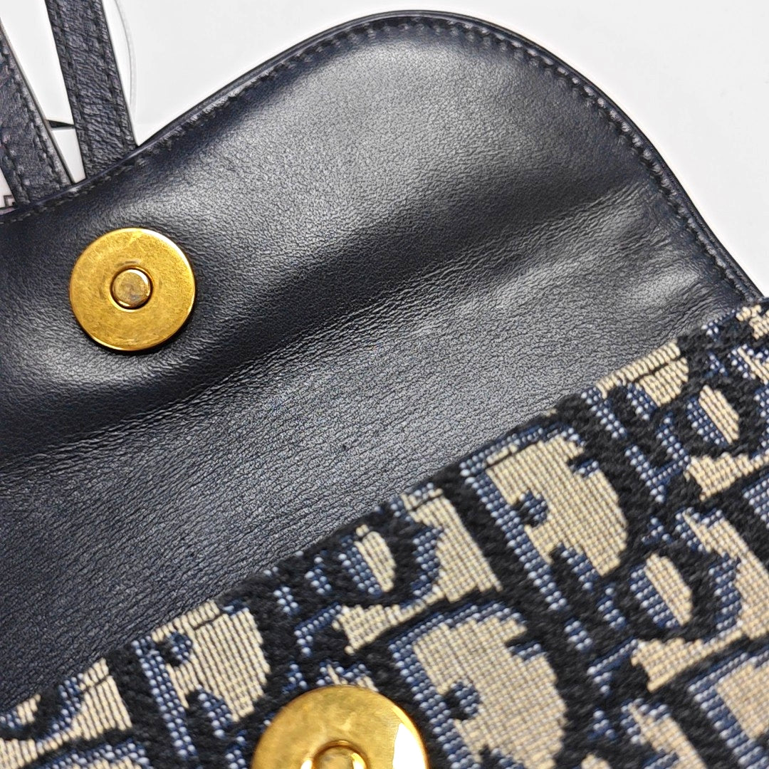 Authenticated pre-owned  Saddle Monogram Canvas Blue - Belt Bag at Looply