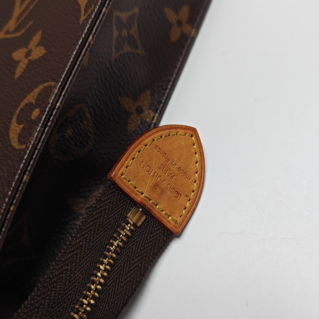 TOILET POCKET 26 Monogram Coated Canvas Brown