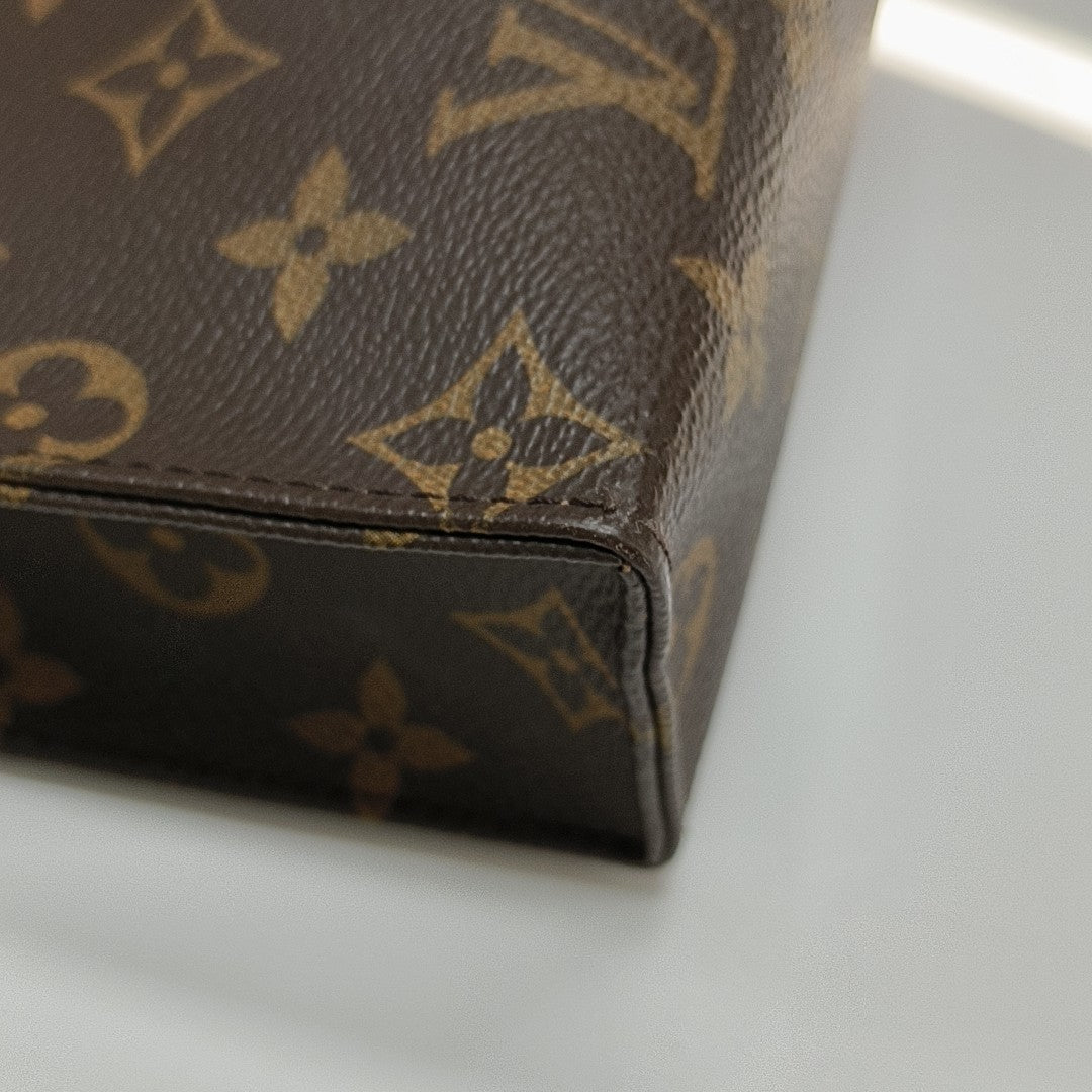 TOILET POCKET 26 Monogram Coated Canvas Brown