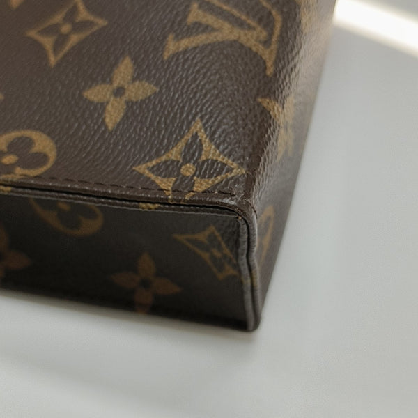 TOILET POCKET 26 Monogram Coated Canvas Brown