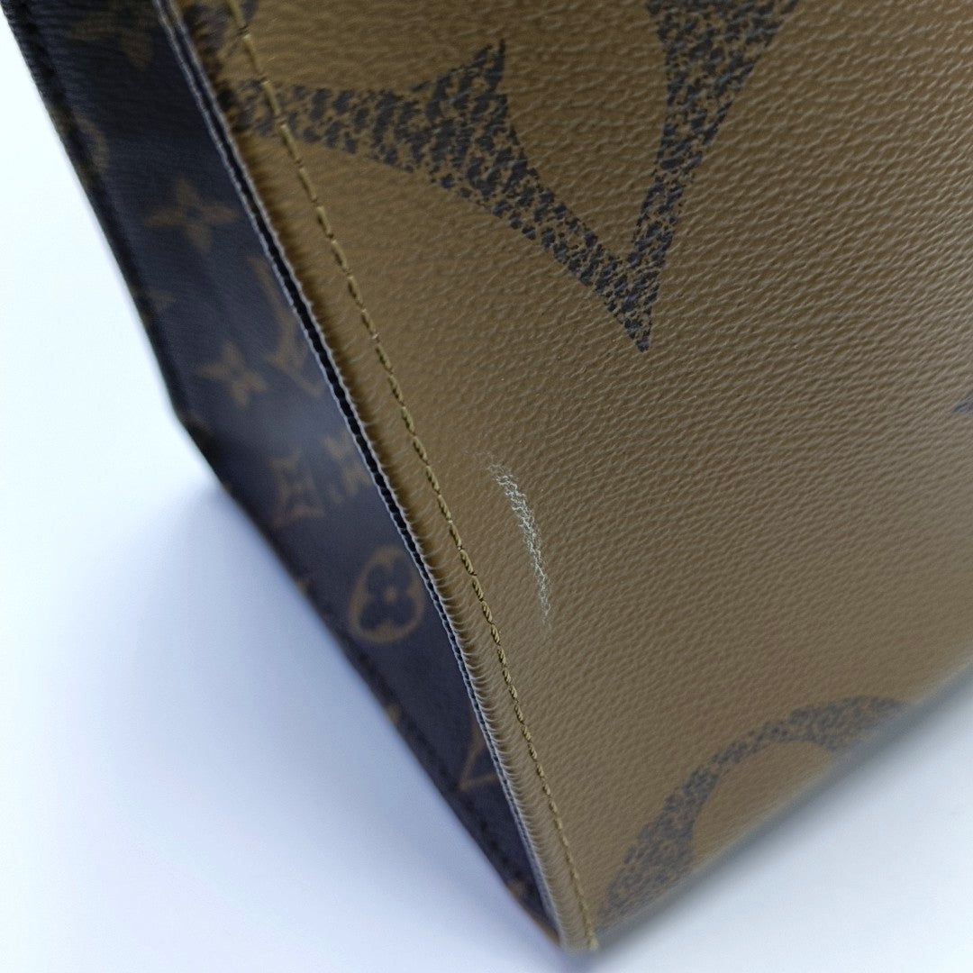 ONTHEGO MM Monogram Coated Canvas Brown