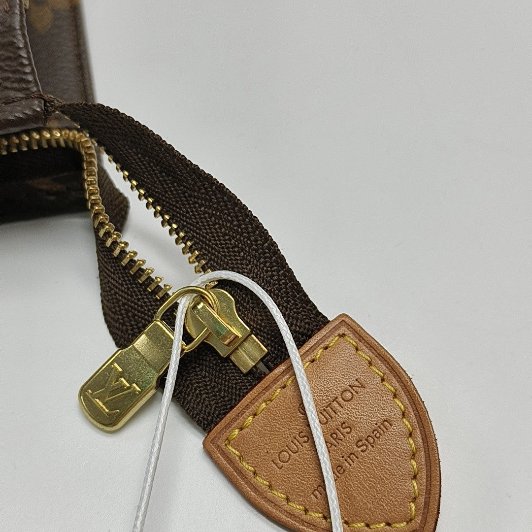 TOILET POCKET 26 Monogram Coated Canvas Brown