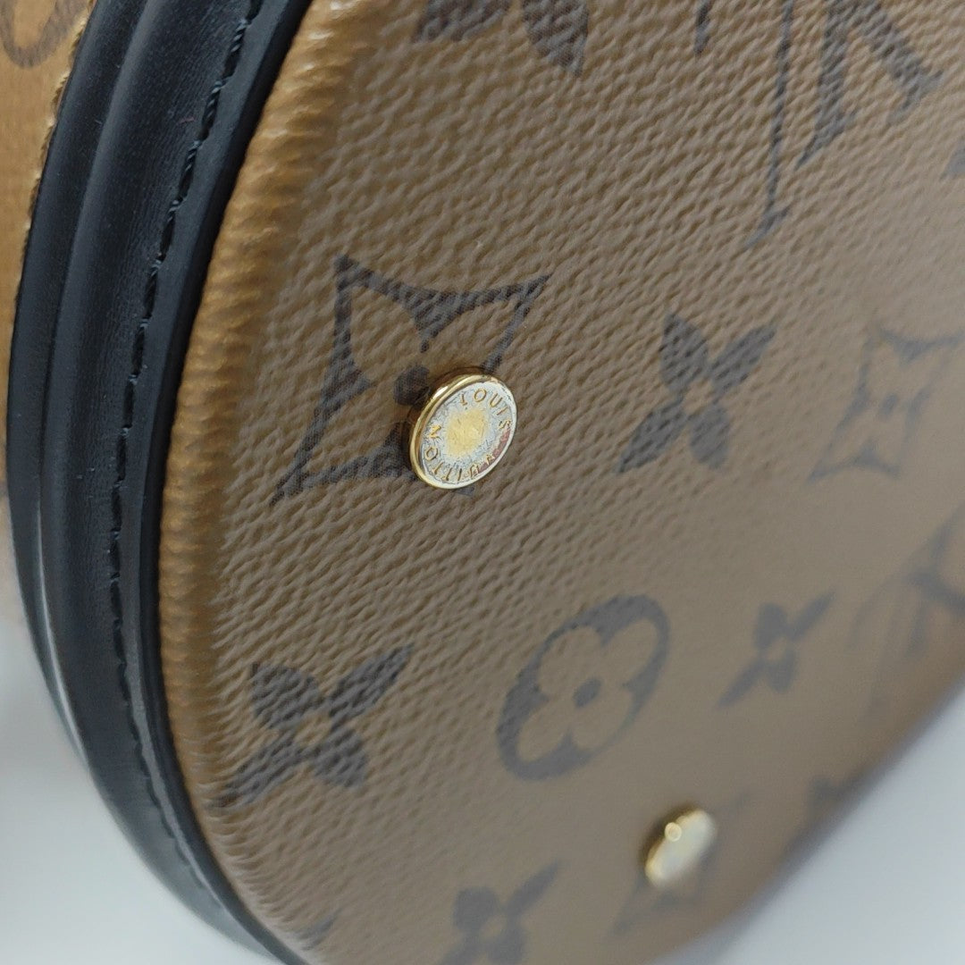 CANNES PM Monogram Coated Canvas Brown