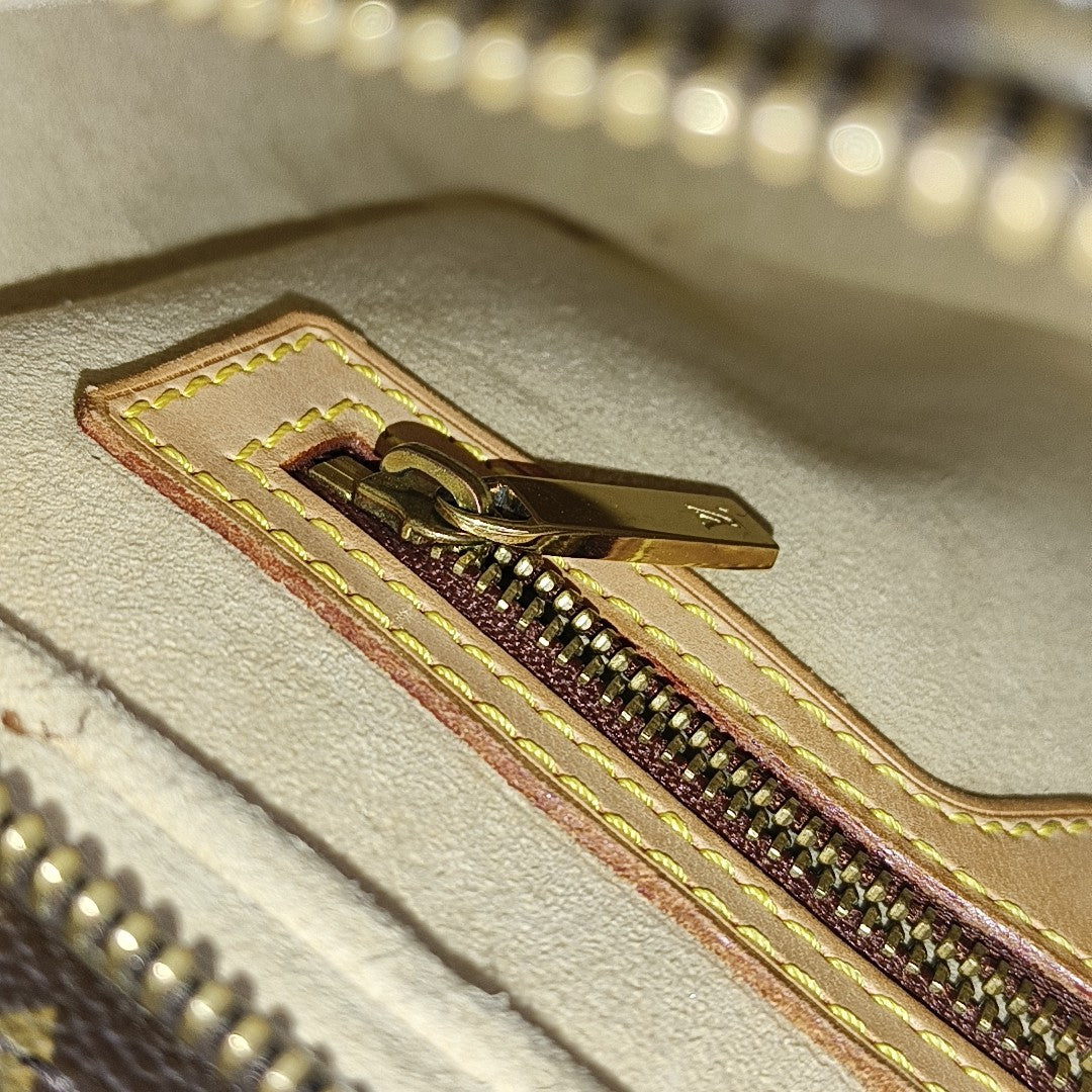 LOOPING MM Monogram Coated Canvas Brown