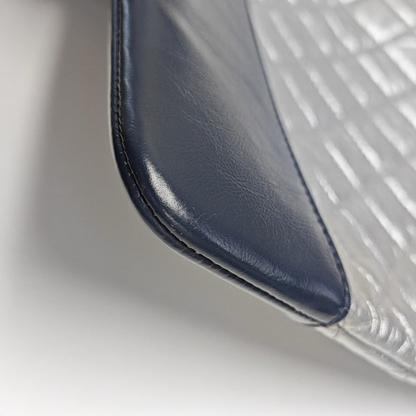 Authenticated pre-owned  GABRIELLE Calfskin Silver - Clutch at Looply