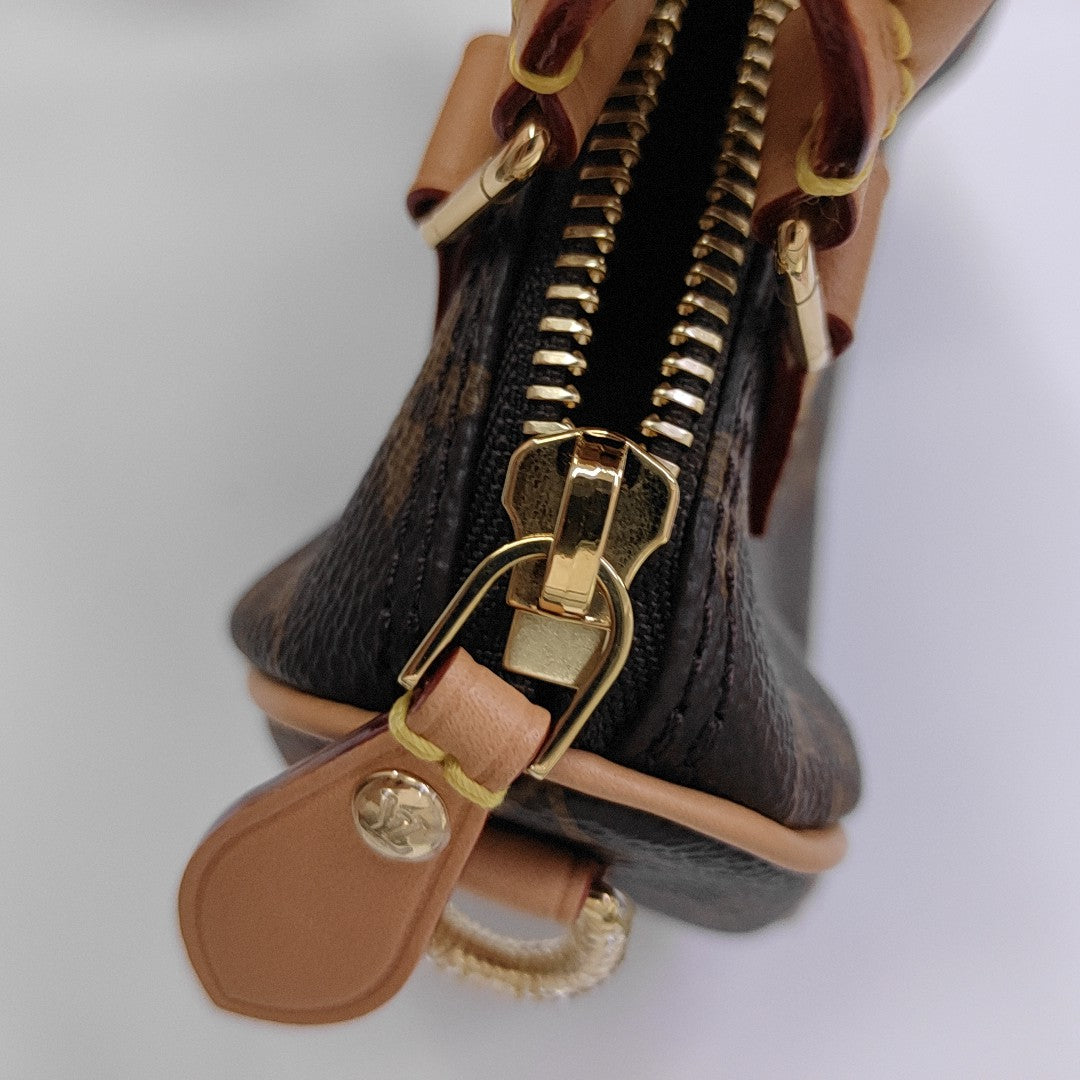 SPEEDY Nano Monogram Coated Canvas Brown