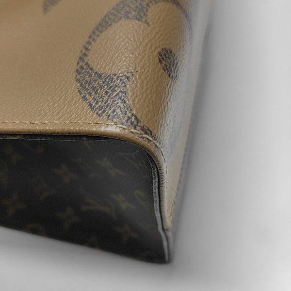 ONTHEGO MM Monogram Coated Canvas Brown