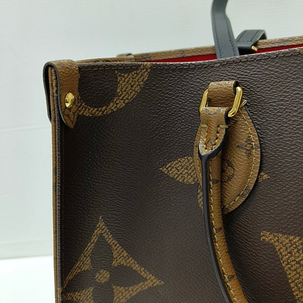 ONTHEGO MM Monogram Coated Canvas Brown