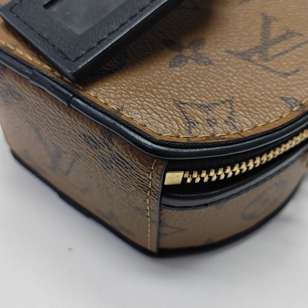 BOITE CHAPEAU Mini Monogram Coated Canvas Brown