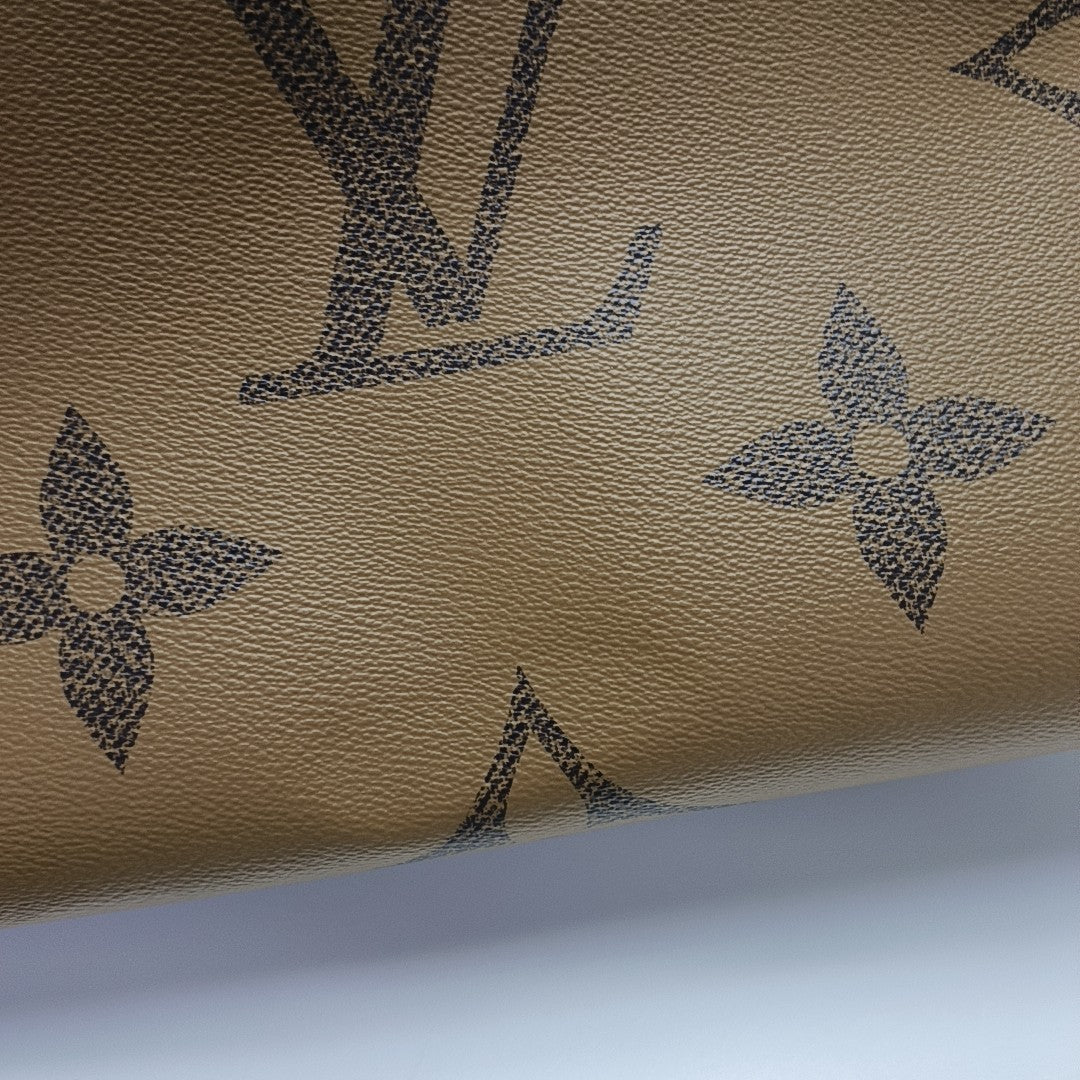 ONTHEGO MM Monogram Coated Canvas Brown