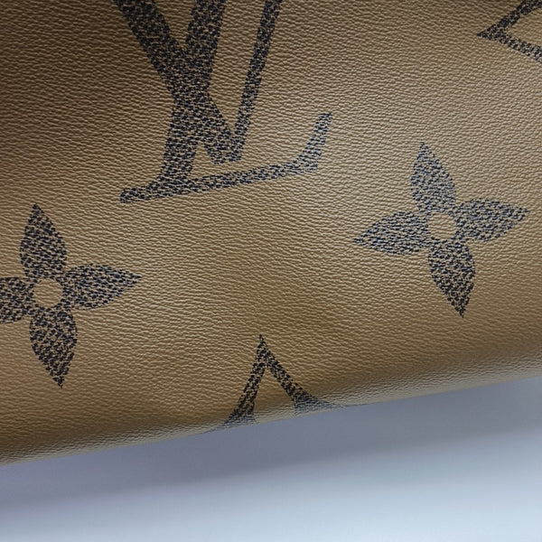 ONTHEGO MM Monogram Coated Canvas Brown