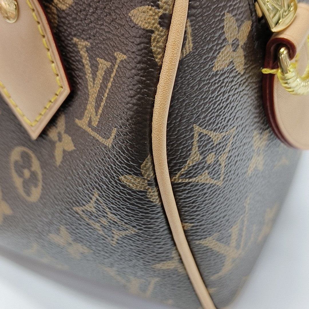 SPEEDY 20 Monogram Coated Canvas Brown