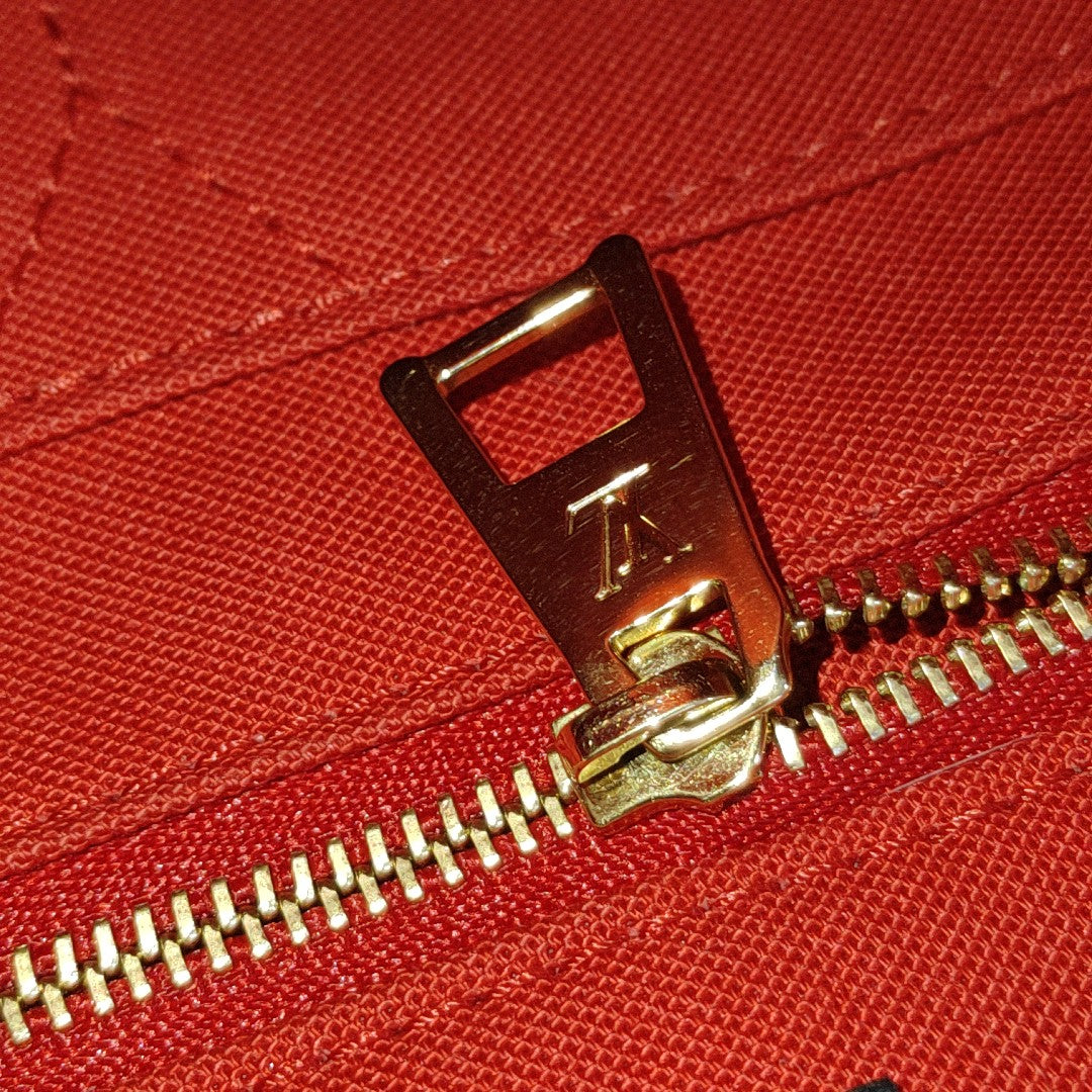 ONTHEGO MM Monogram Coated Canvas Brown