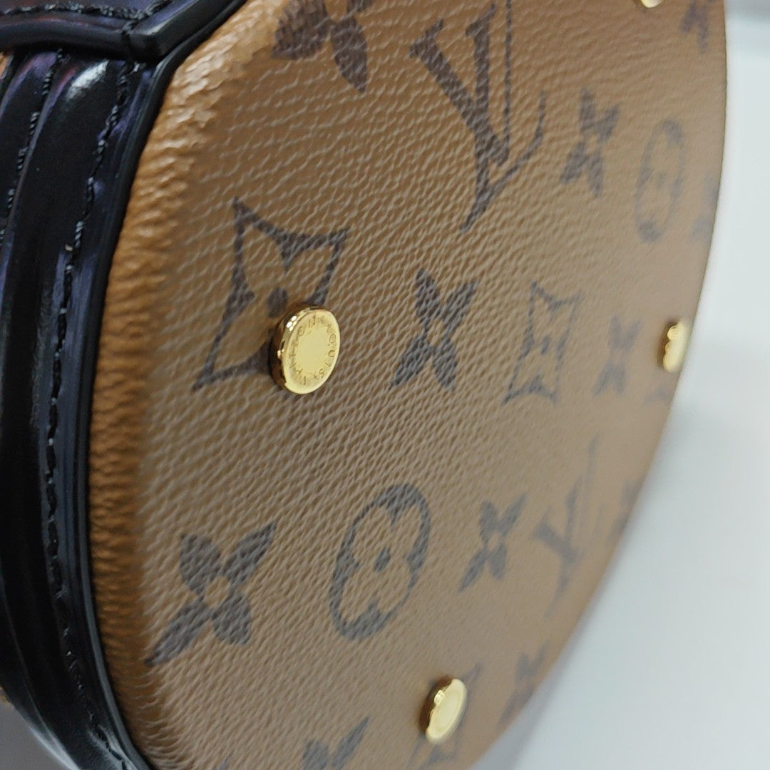 CANNES PM Monogram Coated Canvas Brown