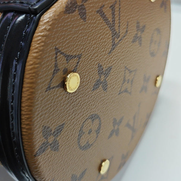 CANNES PM Monogram Coated Canvas Brown