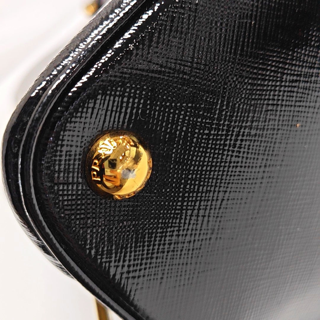 Authenticated pre-owned  Promenade Saffiano Calfskin Black - Top Handle Bag at Looply