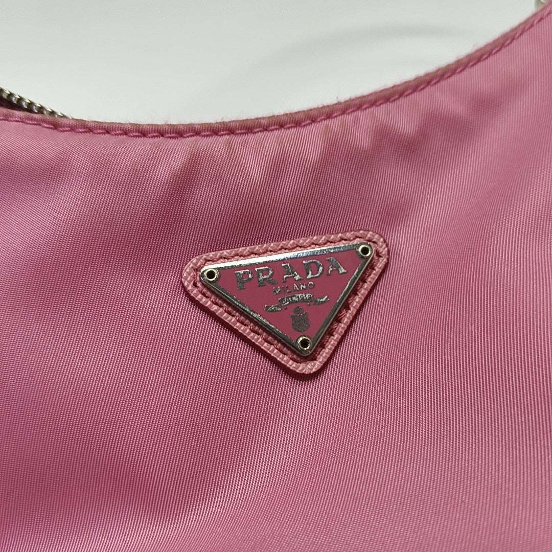 Authenticated pre-owned  Re-Edition2005 Mini Nylon Pink - Top Handle Bag at Looply