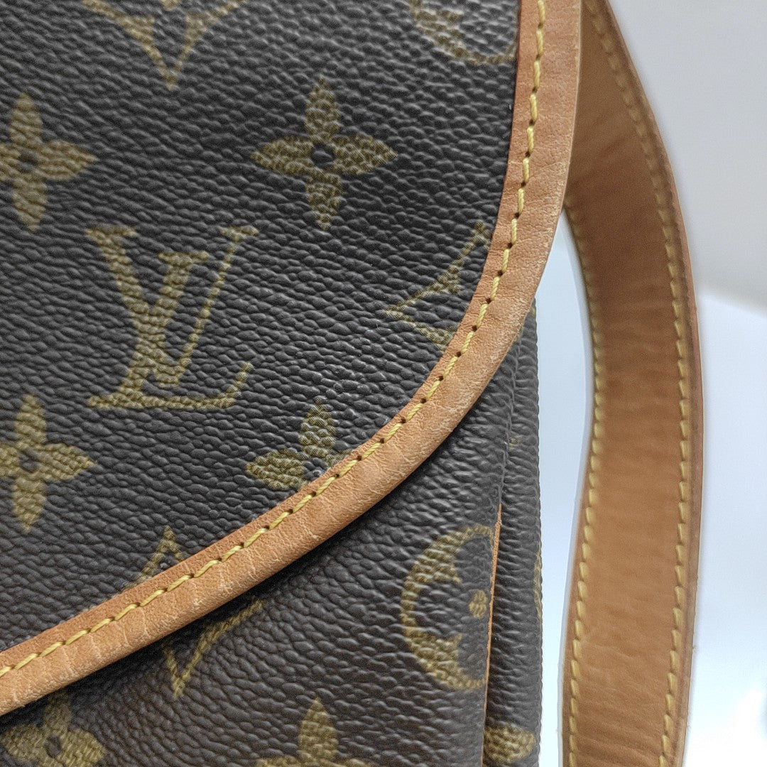 SAUMUR Monogram Coated Canvas Brown