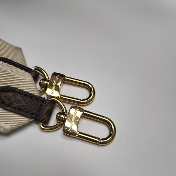 ONTHEGO PM Monogram Coated Canvas Brown