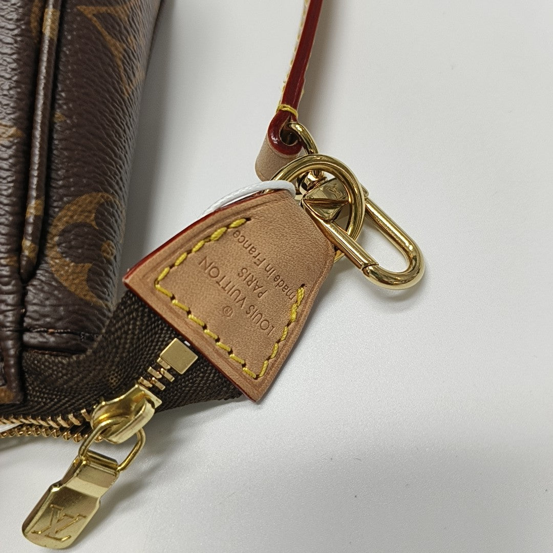 ACCESSOIRES GM Monogram Coated Canvas Brown