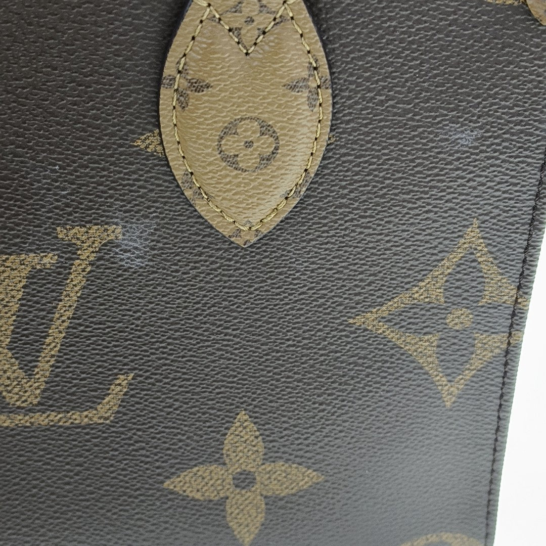 ONTHEGO PM Monogram Coated Canvas Brown