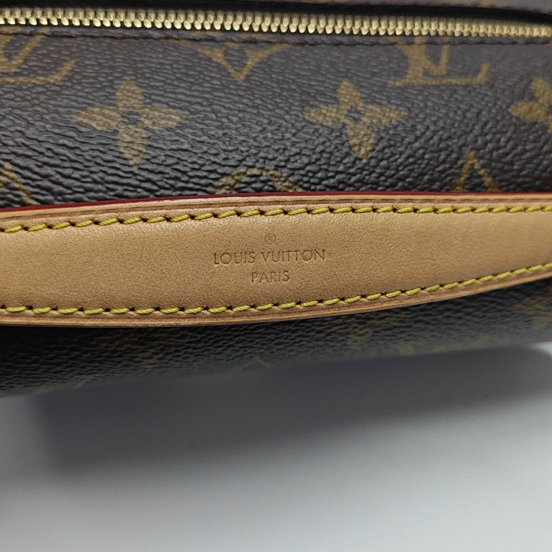 MÉTIS EAST WEST Monogram Coated Canvas Brown