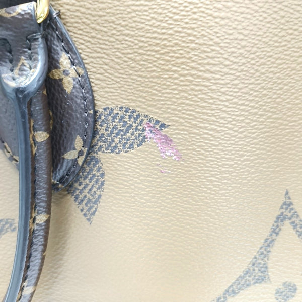 ONTHEGO MM Monogram Coated Canvas Brown