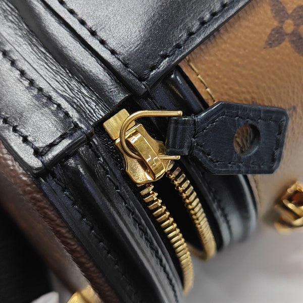 CANNES PM Monogram Coated Canvas Brown