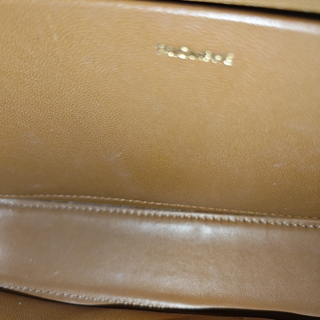 TRIOMPHE Small Coated Canvas Brown