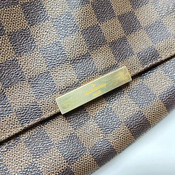 FAVORITE PM Damier Ebene Coated Canvas Brown