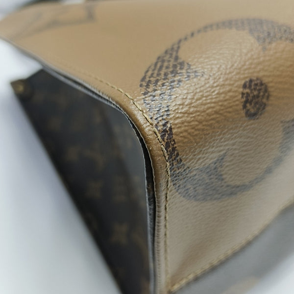 ONTHEGO MM Monogram Coated Canvas Brown
