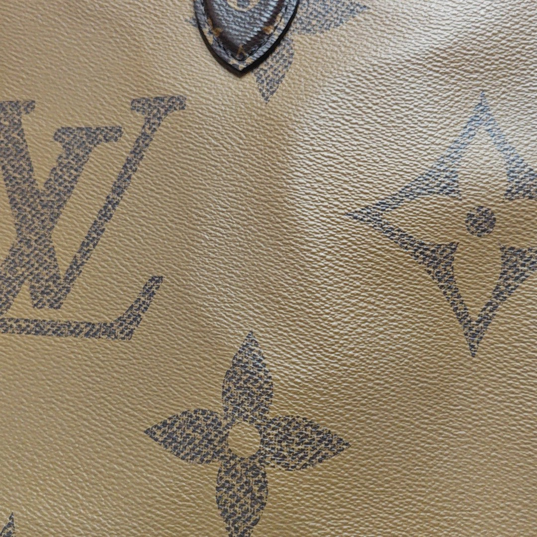 ONTHEGO MM Monogram Coated Canvas Brown