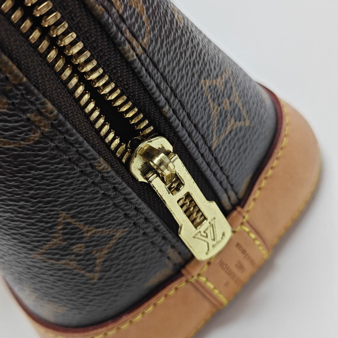 ALMA BB Monogram Coated Canvas Brown