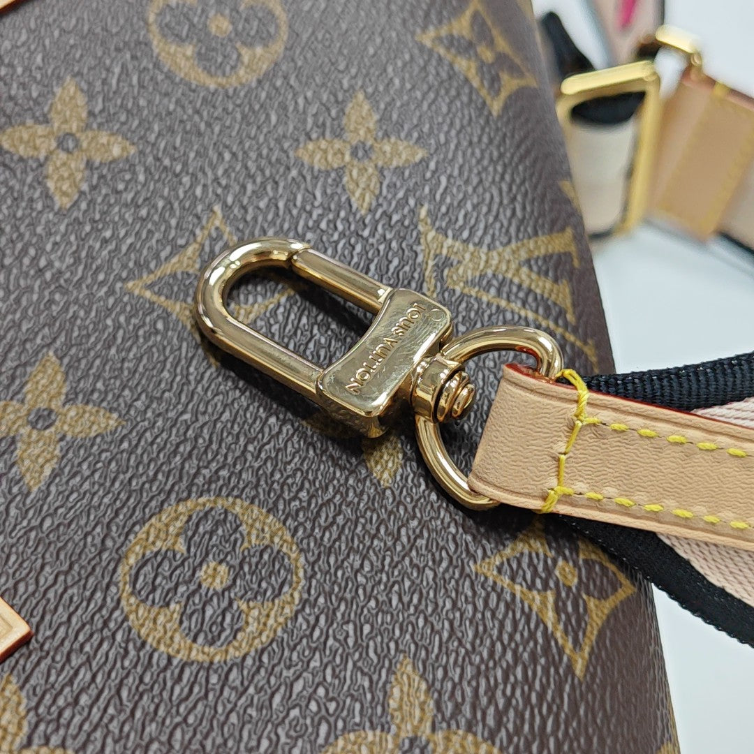 SPEEDY 20 Monogram Coated Canvas Brown