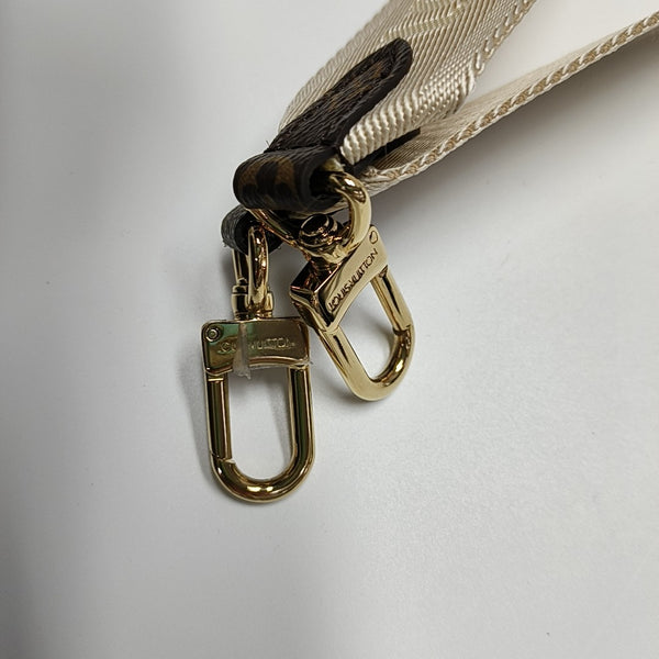 ONTHEGO PM Monogram Coated Canvas Brown