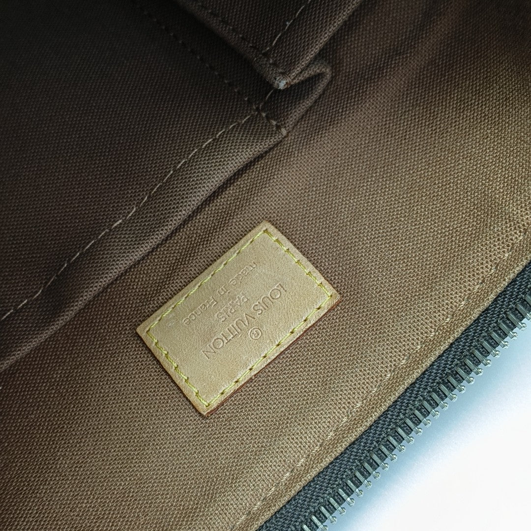 TULUM PM Monogram Coated Canvas Brown
