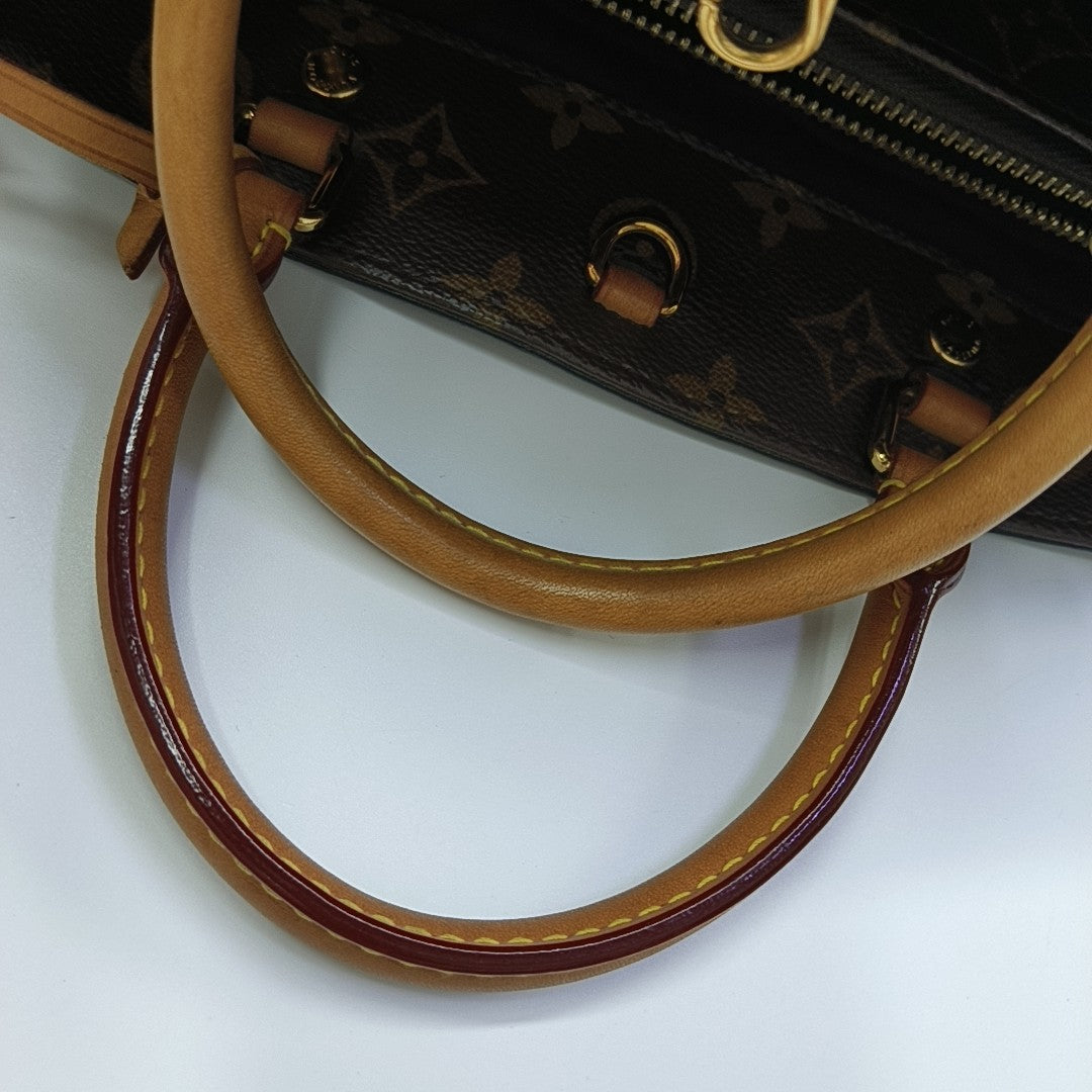 MONTAIGNE Monogram Coated Canvas Brown