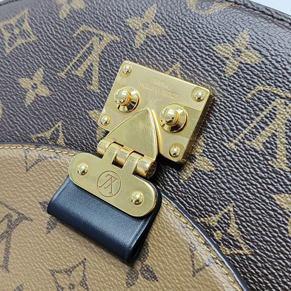 EDEN Monogram Coated Canvas Brown