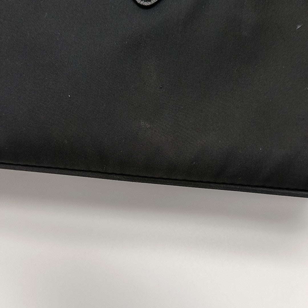 Authenticated pre-owned  Re-Edition2000 Mini Nylon Black - Top Handle Bag at Looply