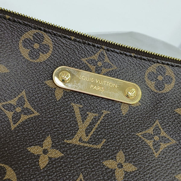 Pochette Eva Monogram Coated Canvas Brown