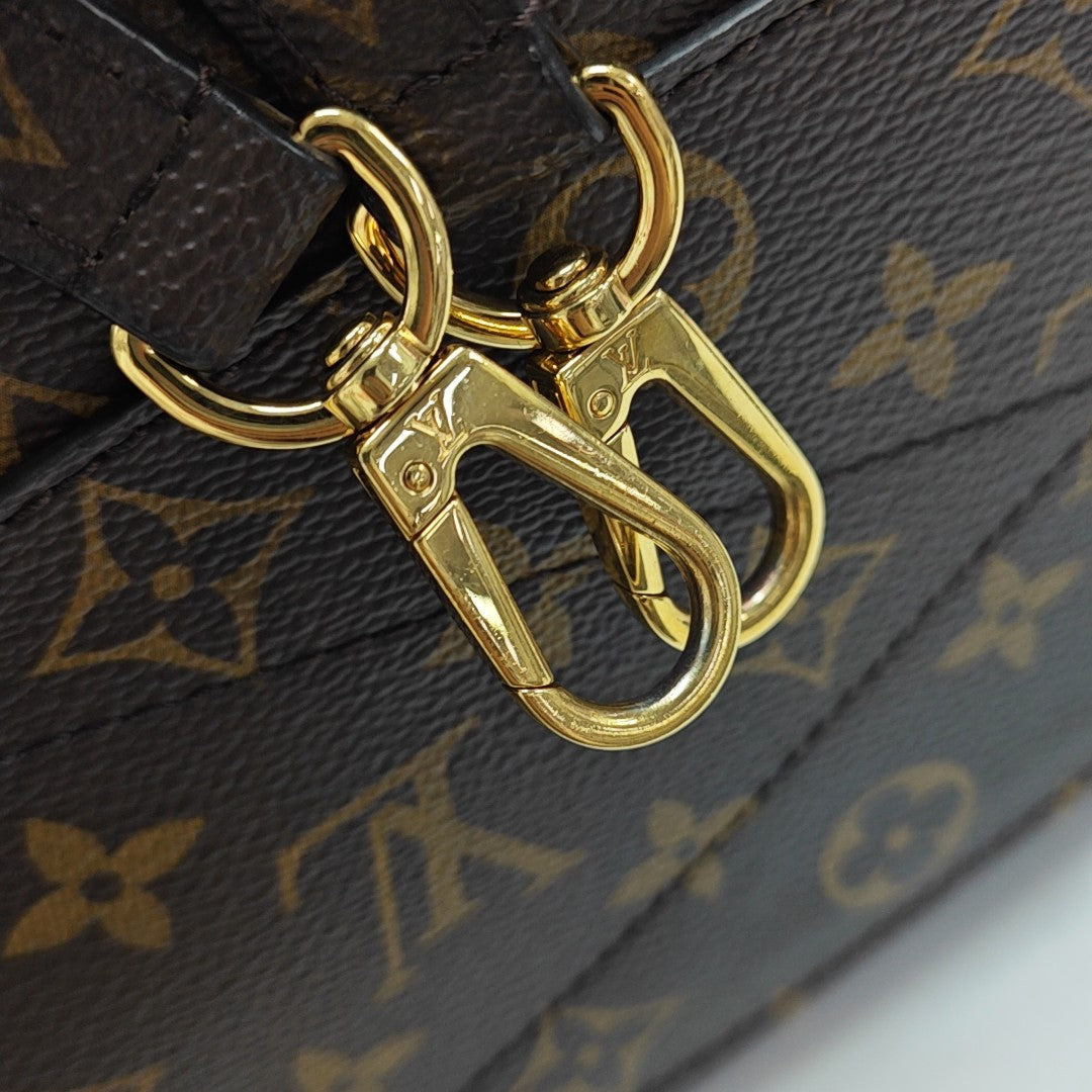 MONTAIGNE GM Monogram Coated Canvas Brown