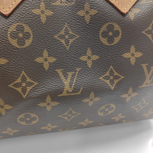 SPEEDY 25 Monogram Coated Canvas Brown