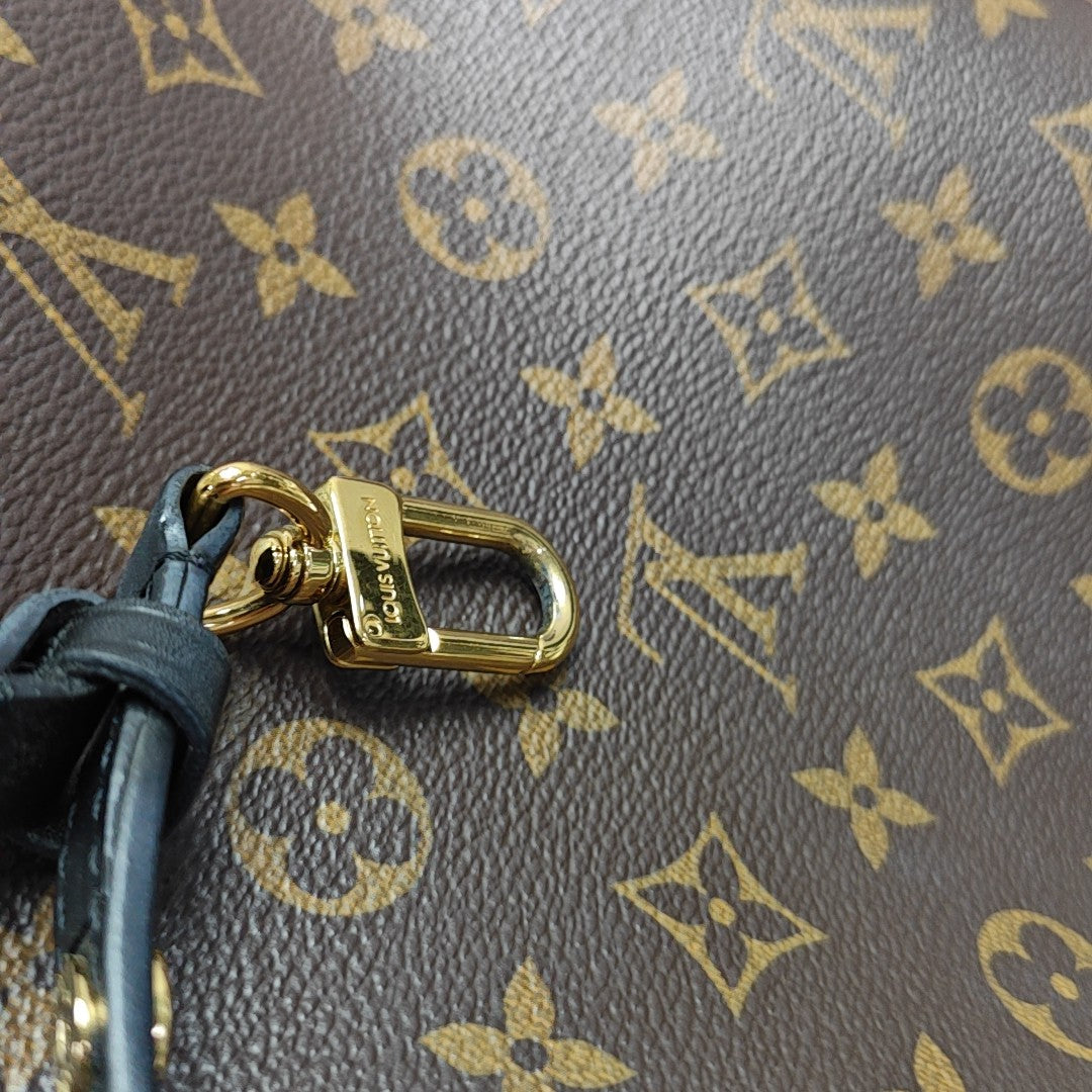 NÉONOÉ MM Monogram Coated Canvas Brown