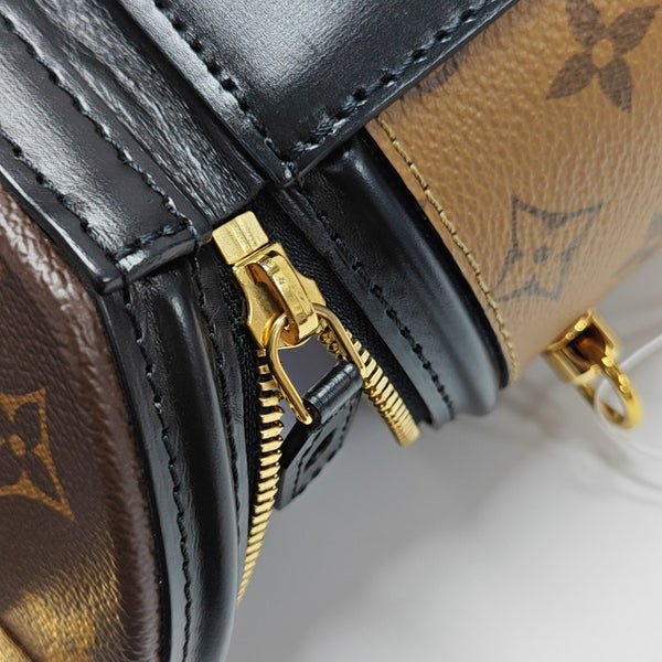 CANNES PM Monogram Coated Canvas Brown