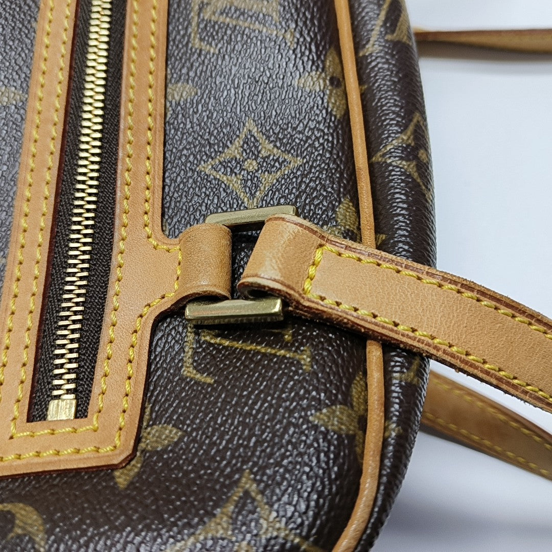 CITE MM Monogram Coated Canvas Brown