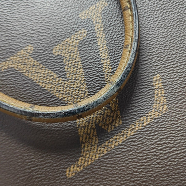 ONTHEGO MM Monogram Coated Canvas Brown