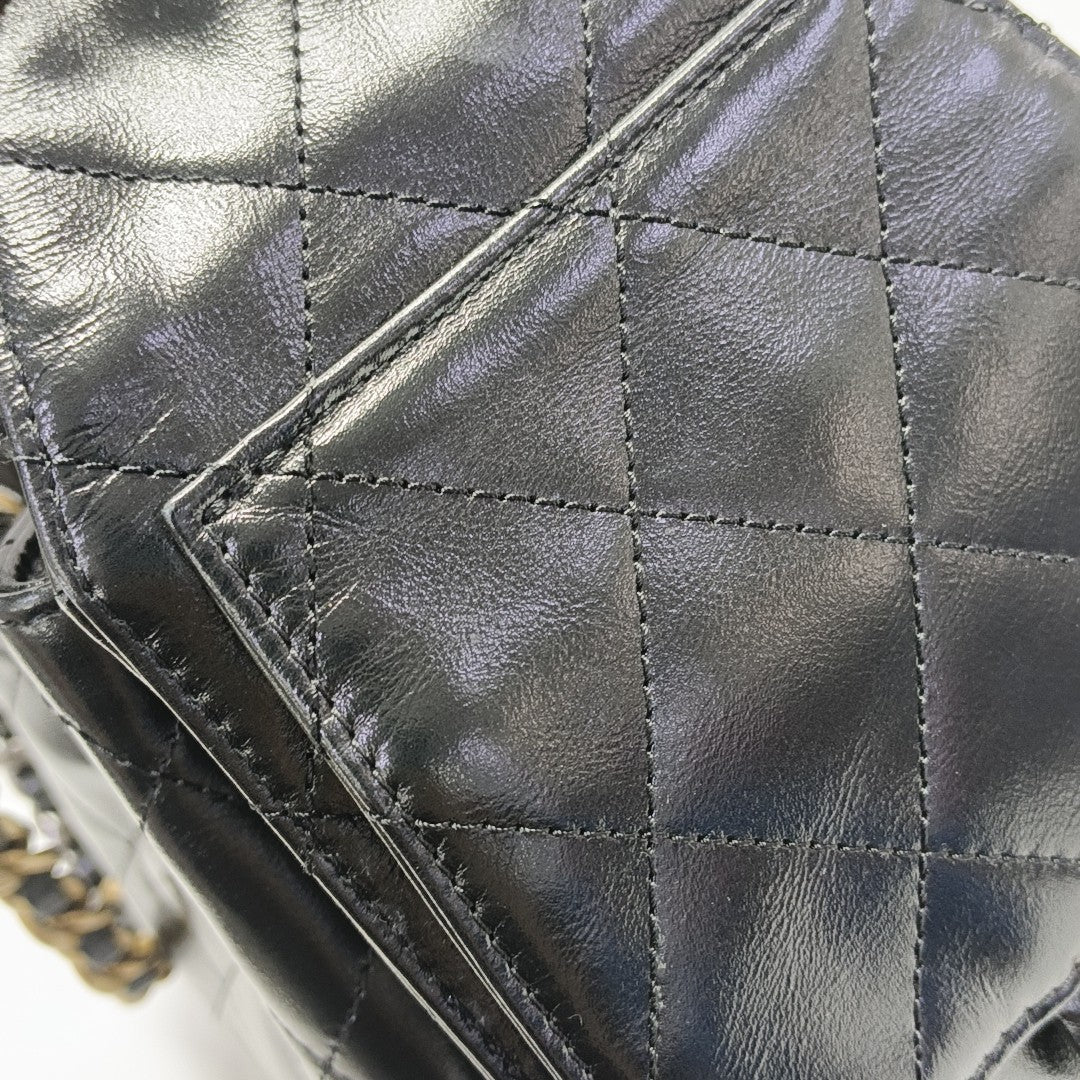 CHANEL 25 Small Quilted Waxed Cafskin Black