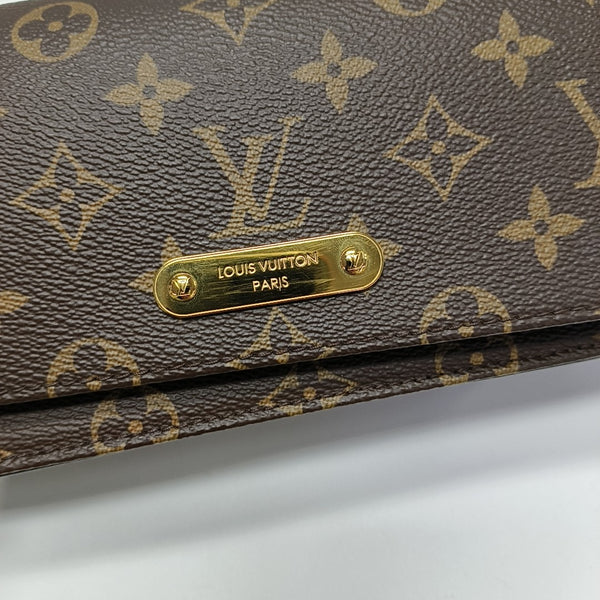 Lily Monogram Coated Canvas Brown