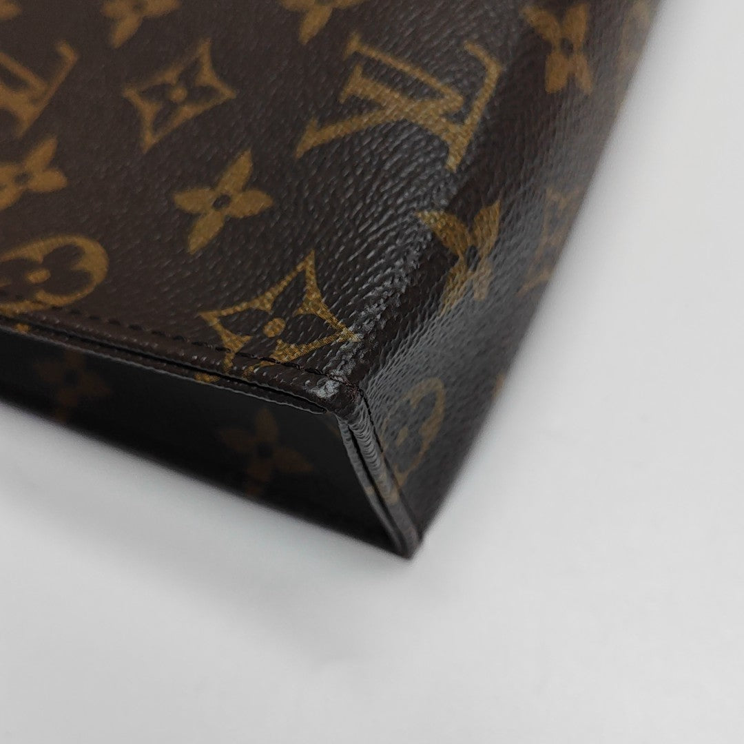 TOILET POCKET 26 Monogram Coated Canvas Brown