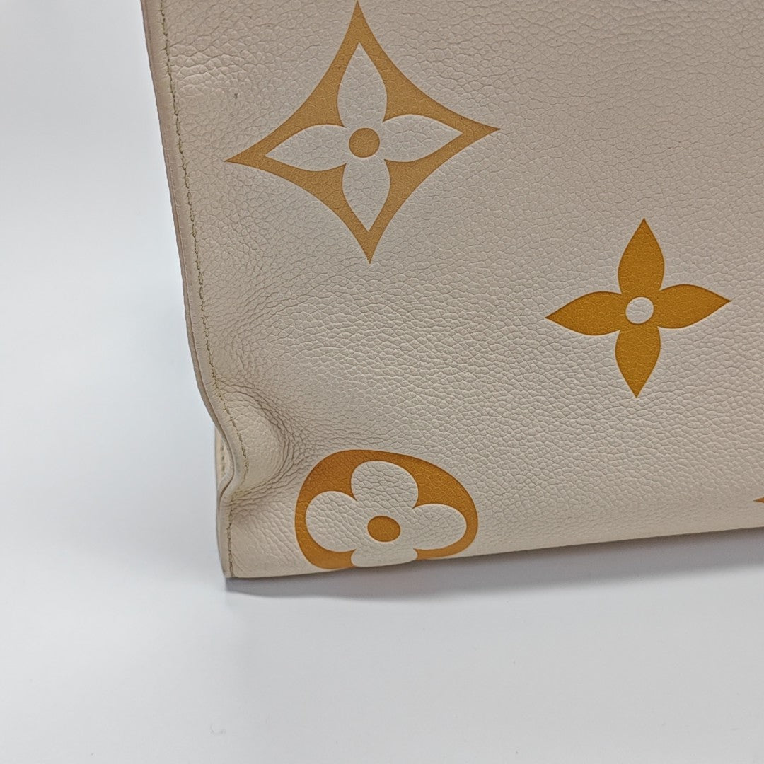 ONTHEGO MM Monogram Calfskin Beige